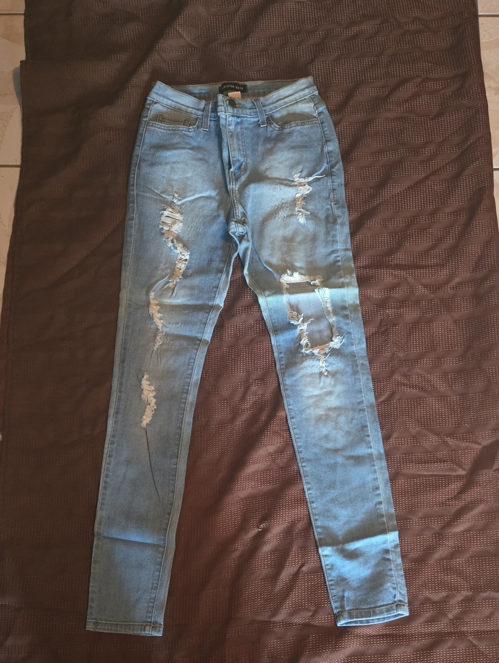 Fashion Nova Light Blue Ripped Skinny Jeans